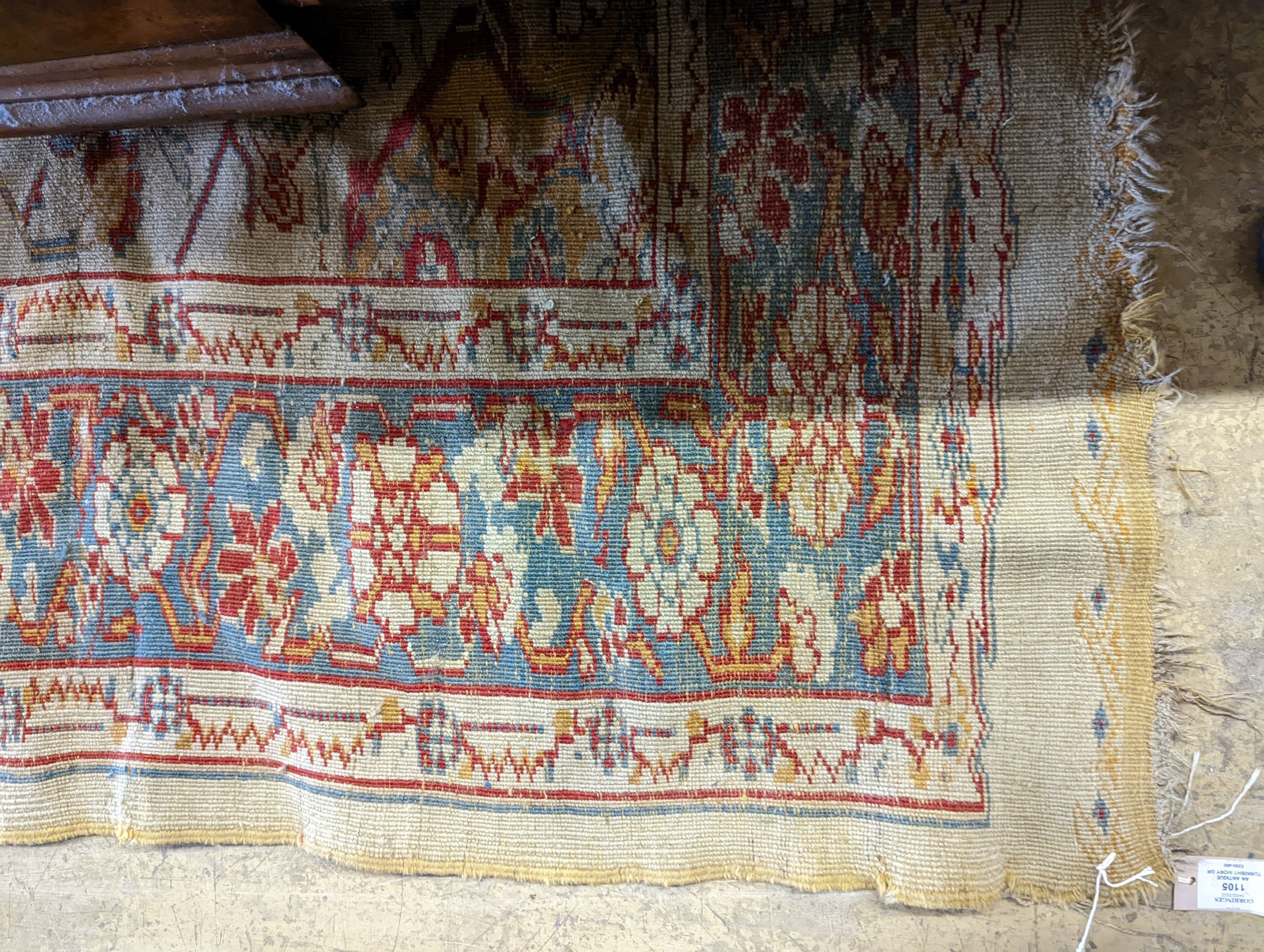 An antique Turkish? ivory ground rug, 218 cm long, 145 cm wide